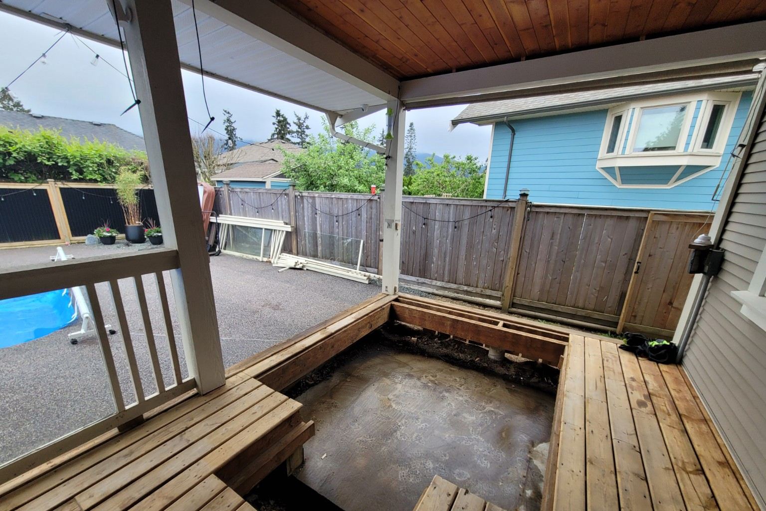 The cleared deck opening in a Nanaimo backyard after Junk Matters removed the hot tub