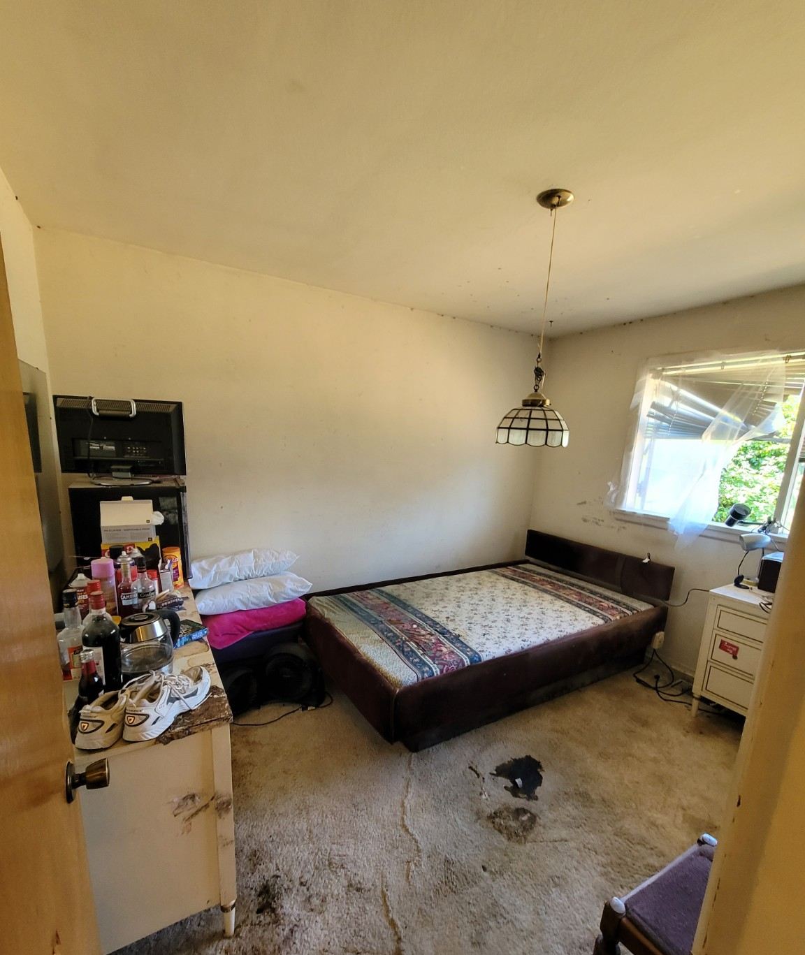 The same Nanaimo bedroom cleared and swept after the Junk Matters hoarding cleanout